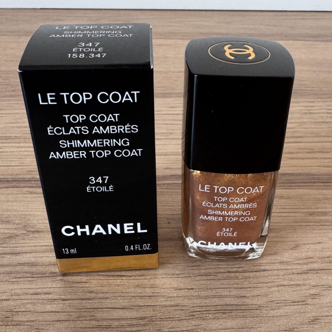 Chanel 347 Étoilé shimmering amber top coat DBA