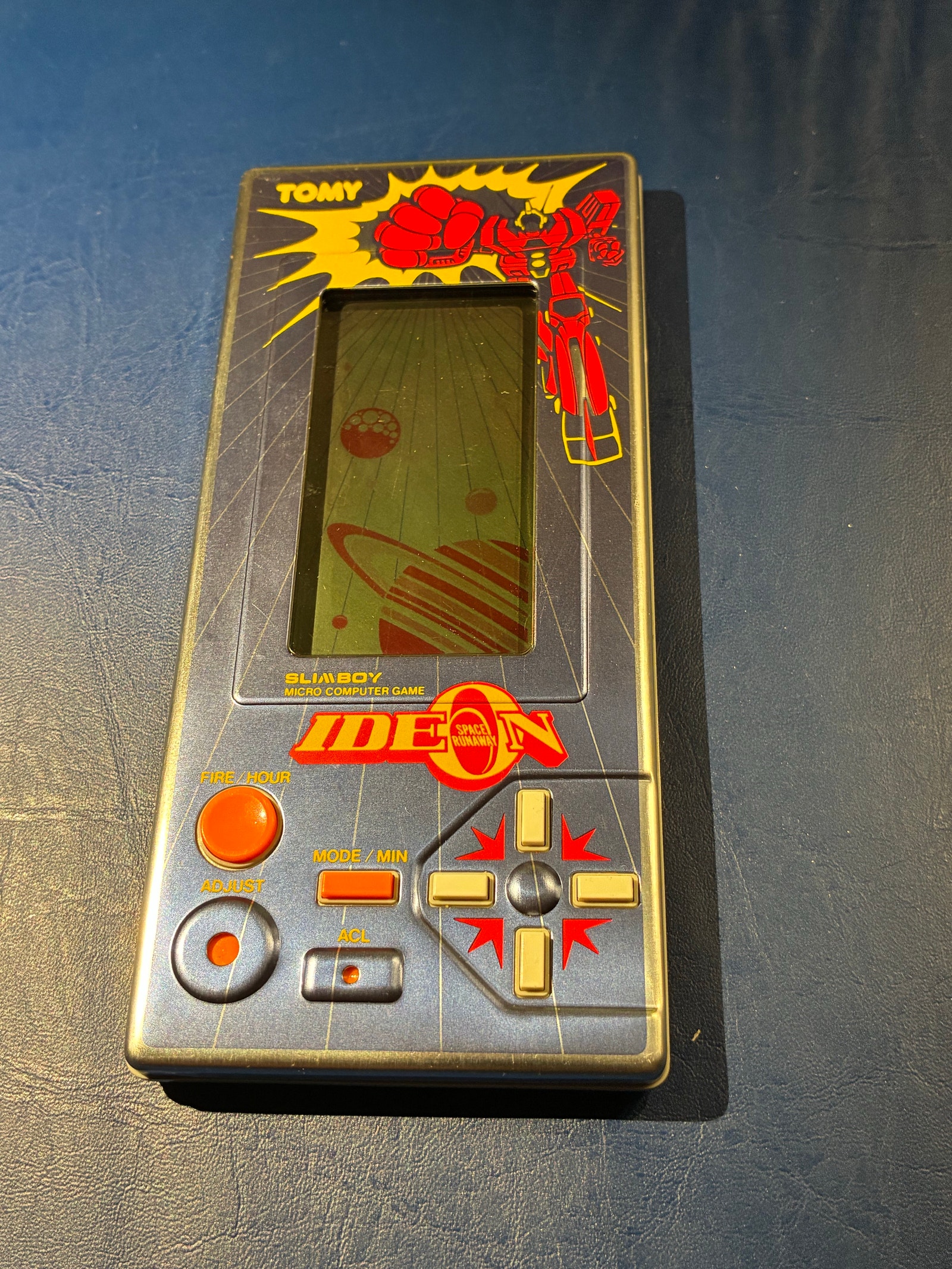 Tomy Ideon Slimboy håndholdt elektronisk spil | DBA
