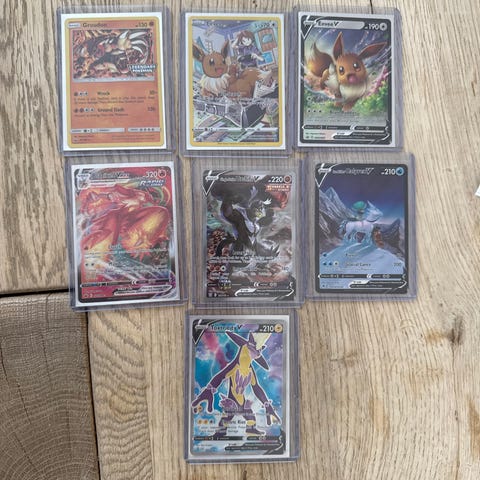 Pokemon kort samling med Charizard VMAX, Lugia EX og M Sharpedo EX | DBA