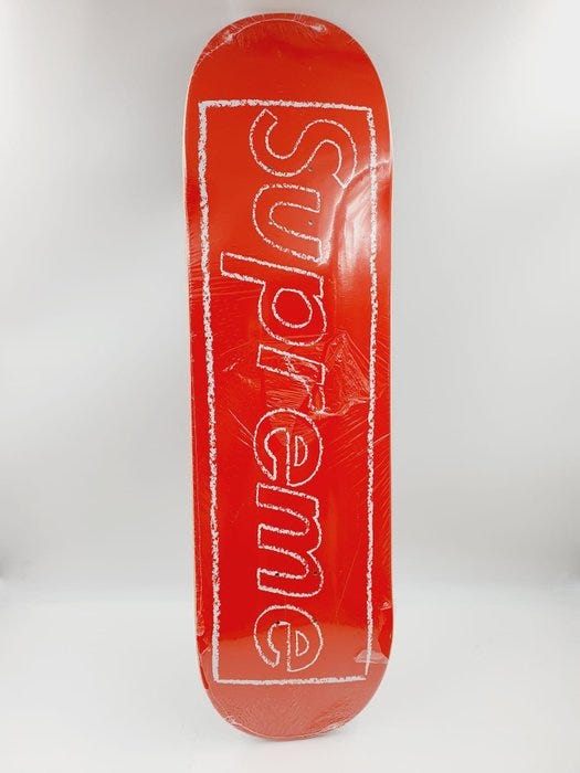 Kaws (1974) - Kaws x Supreme Red Skateboard Chalk Logo 2021 | DBA