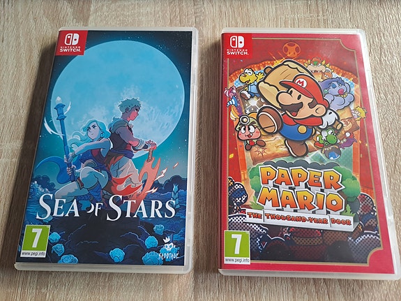 2 Switch spil sælges samlet.